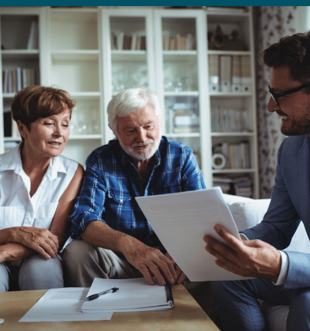 a senior couple is talking to lawyer